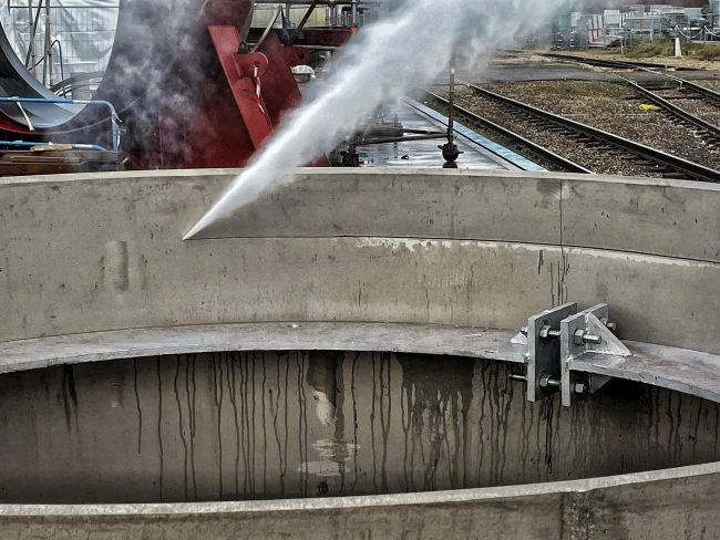 Abrasive cold cutting through pipework in hazardous chemical environment