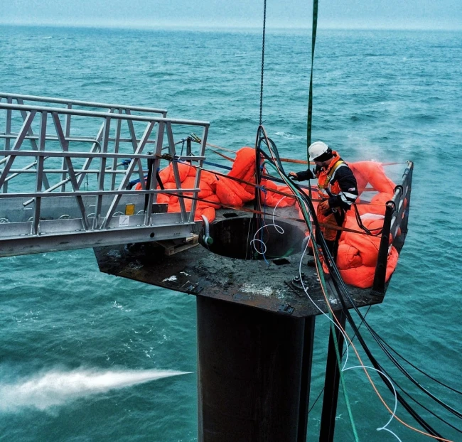 Abrasive water jet cutting for well head removal and conductor pipe severance in oil and gas decommissioning