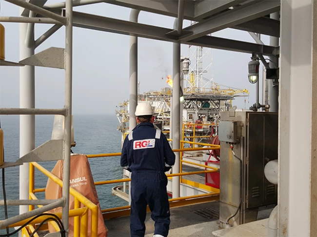 Containerised UHP water jetting system cleaning NORM contaminated drill tubes on exploration site