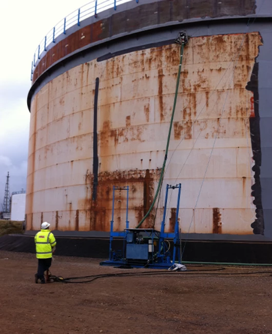 Remote controlled tank and vessel cleaning using UHP water jetting in petrochemical facility