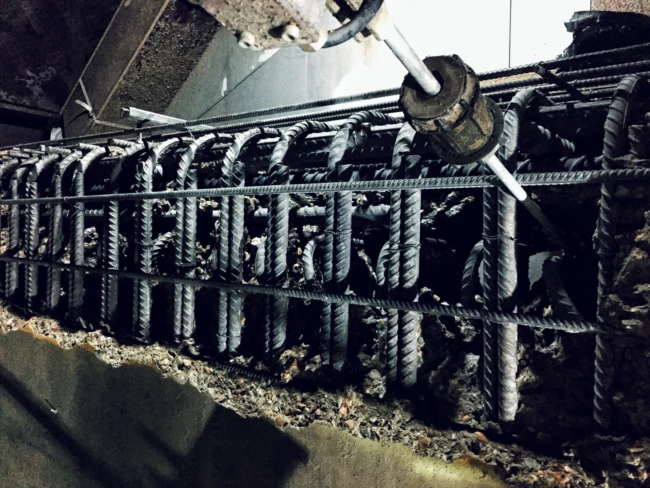 Hydrodemolition selective concrete removal exposing clean intact rebar on a UK structure